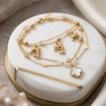 Elegant Dolphin Charm Gold Bracelet with Pearl Accents