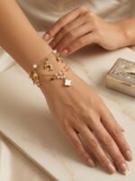 Elegant Dolphin Charm Gold Bracelet with Pearl Accents - Image 2